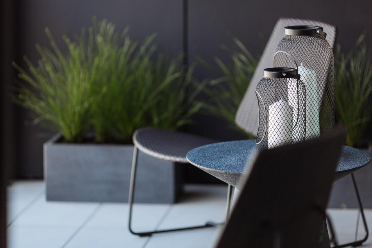 One Global Resorts Green Square Cité de Cité de Sydney Extérieur photo The "Butterfly" chair